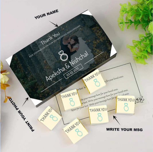 Elegant white anniversary return gift chocolates