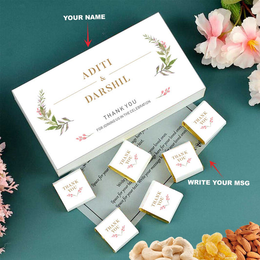 customized white wooden box with all wrapper printed chocolates. There is also a personalized message printed on Message paper inside the box.