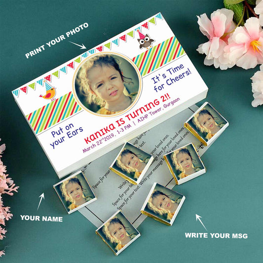 customized white wooden box with a wrapper of all-printed chocolates. There is also a personalized message printed on Message paper inside the box.