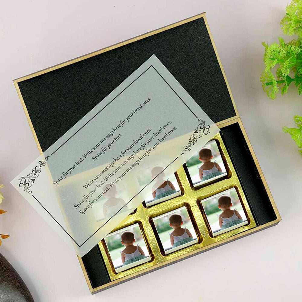customized black wooden box with wrapper of all-printed chocolates. There is also a personalized message printed on Message paper inside the box.