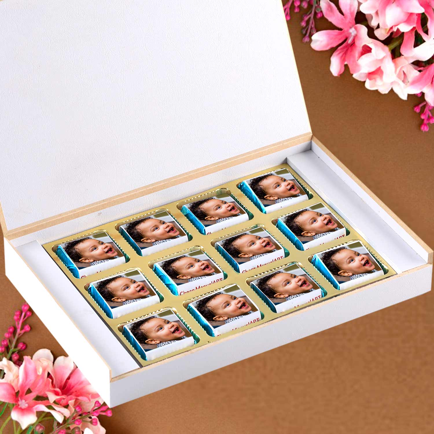 customized white wooden box with a wrapper of all-printed chocolates. There is also a personalized message printed on Message paper inside the box.