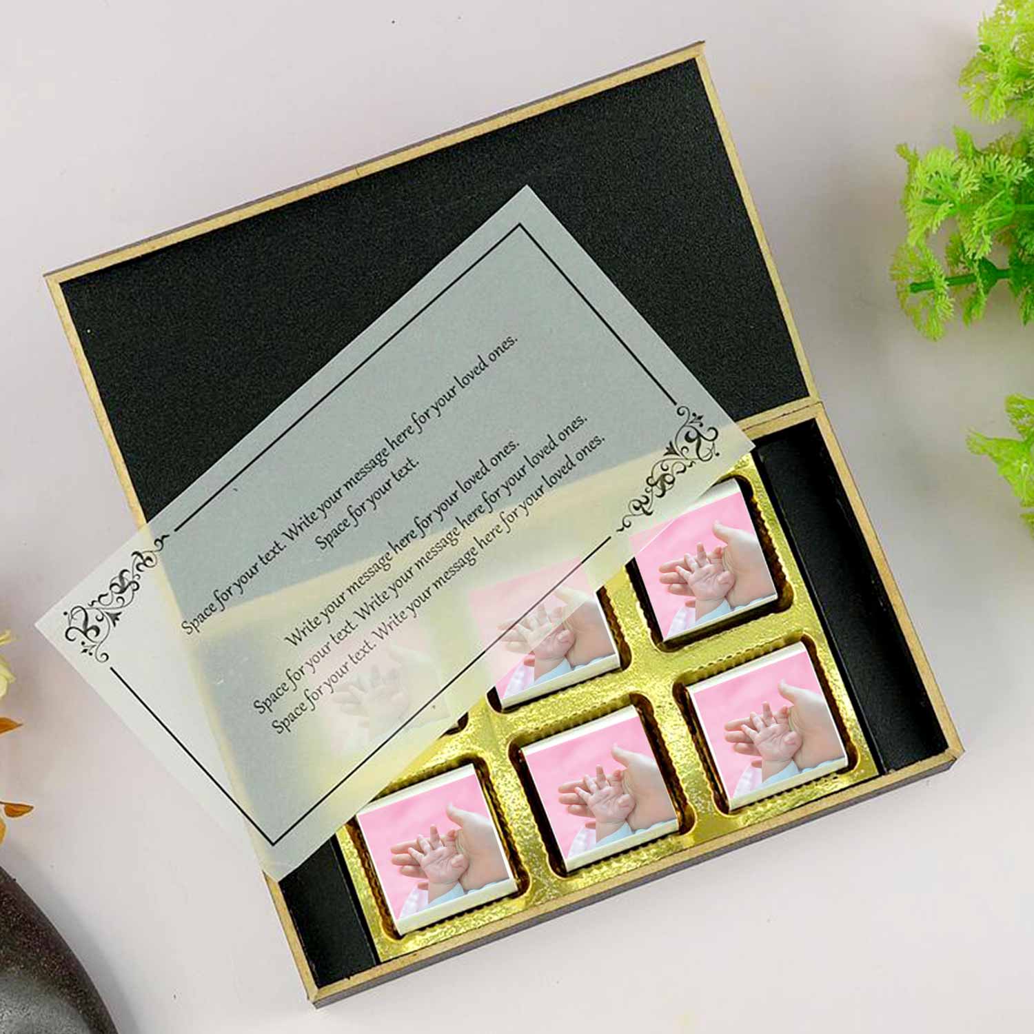 Customized black wooden box with all wrapper printed chocolates. There is also a personalized message printed on Message paper inside the box..