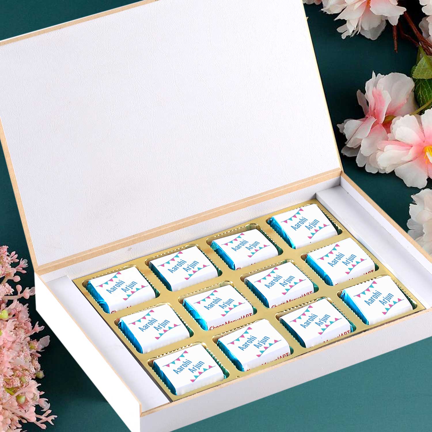 customized white wooden box with all wrapper printed chocolates. There is also a personalized message printed on Message paper inside the box.